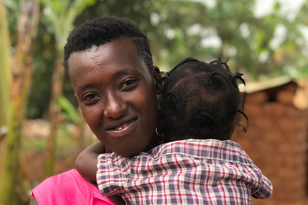 Rwema, 19, is determined to go back to school as soon as they open. She has received education and support from Kvinna till Kvinna's partner organisation Réseau des Femmes Oeuvrant pour le Développement Rural. Réseau des Femmes works to empower rural women and girls in Rwanda, among others by fighting gender-based violence and teenage pregnancy. Photo: Kvinna till Kvinna / Aline Niwenshuti 