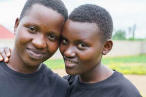 Lea, 18, and Honorine, 17, have gotten to know each other through Empower Rwanda’s programme “Her Voice, Her Right”.