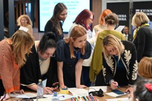 Participants engaging in group discussions.